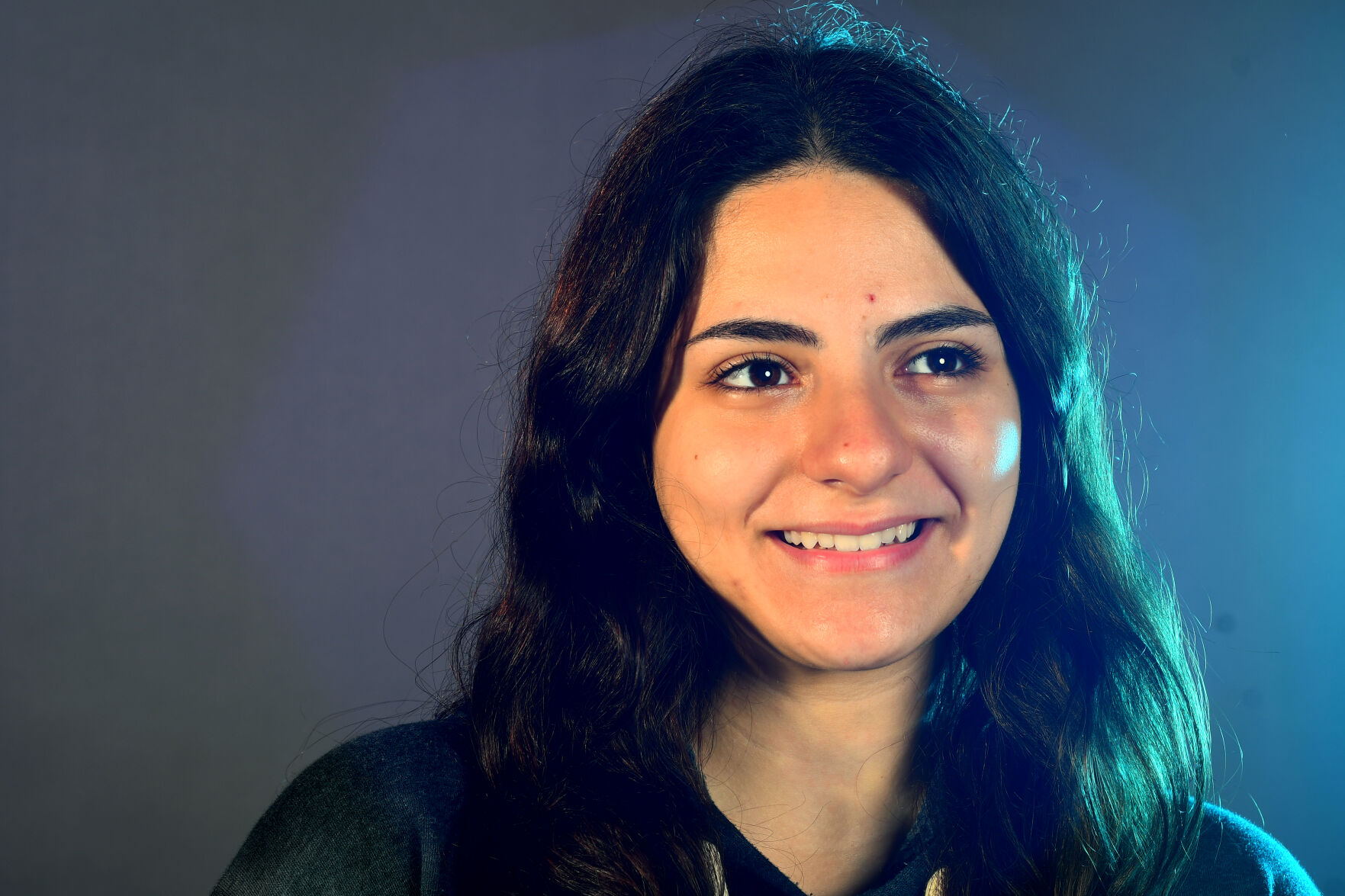 MU freshman pre-med student Fatima Almansouri smiles for a portrait